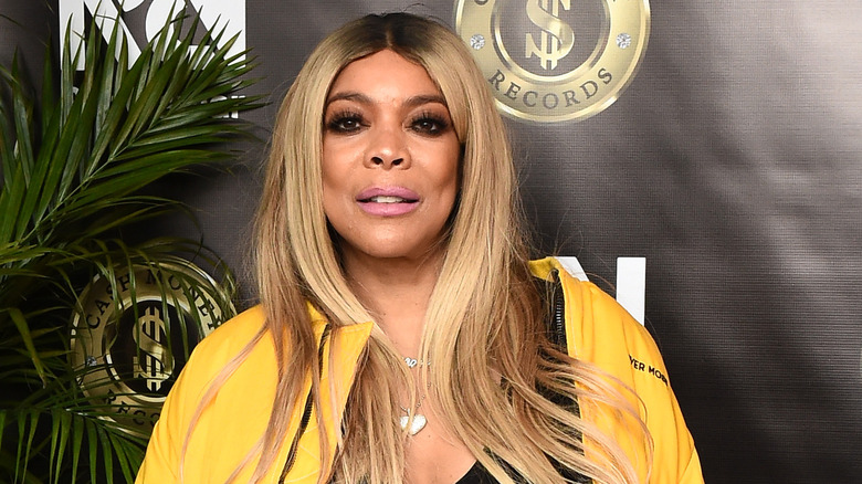 Wendy Williams in a yellow top
