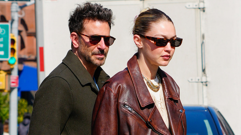 Gigi Hadid and Bradley Cooper wearing sunglasses