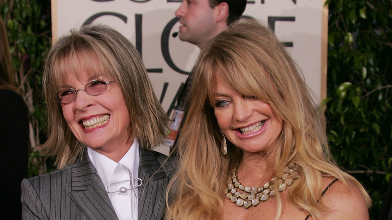 Goldie Hawn posing with Diane Keaton