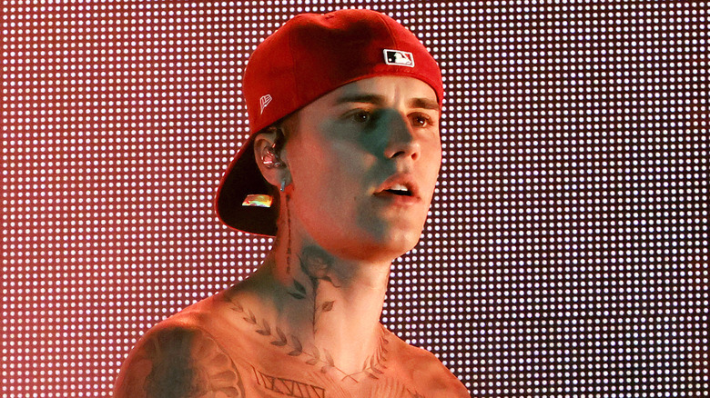 Justin Bieber wearing red hat