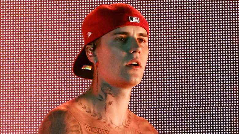 Justin Bieber wearing red hat