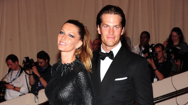 Tom Brady and Gisele Bündchen pose 