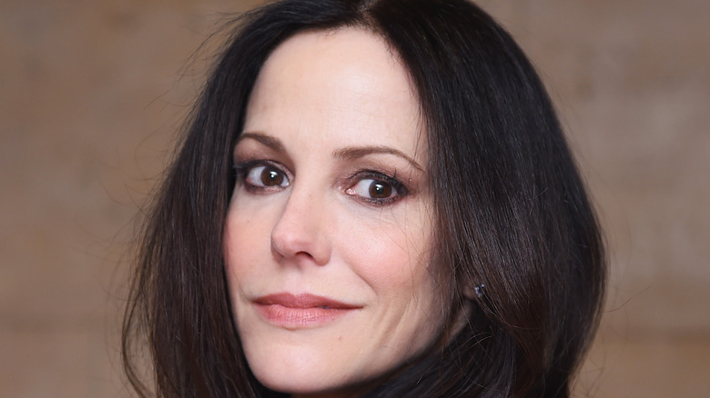 Mary-Louise Parker smirking