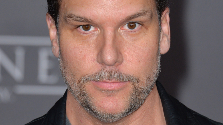 Dane Cook frowns with gray beard