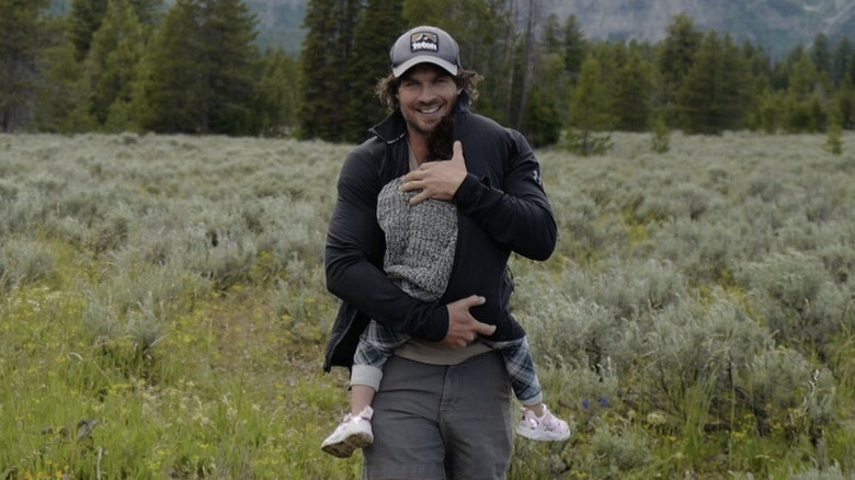 Ian Somerhalder holding his daughter