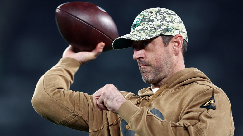 Aaron Rodgers throwing a football