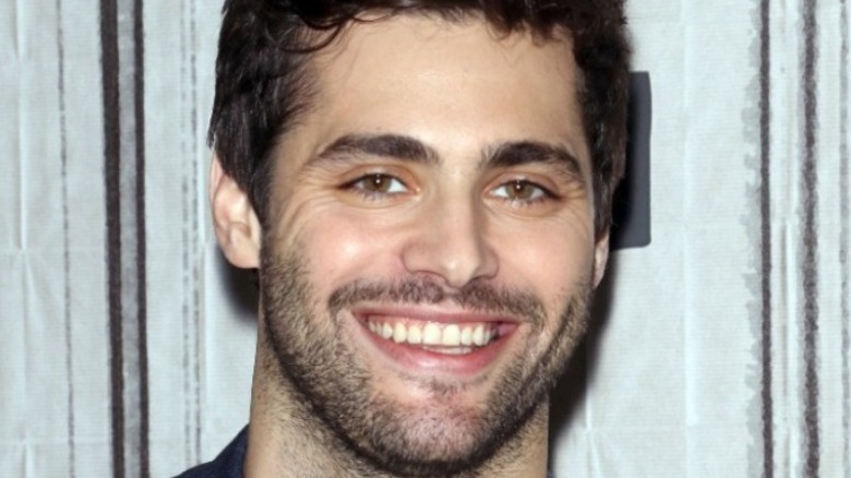 Matthew Daddario smiling at the camera