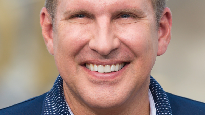 Todd Chrisley smiles