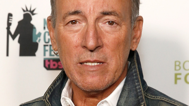 Bruce Springsteen poses at event