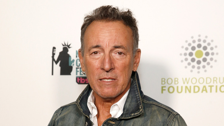 Bruce Springsteen poses at event