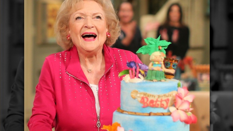 Betty White celebrating birthday cake