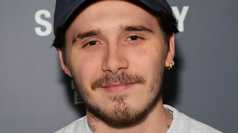 Brooklyn Beckham smiling