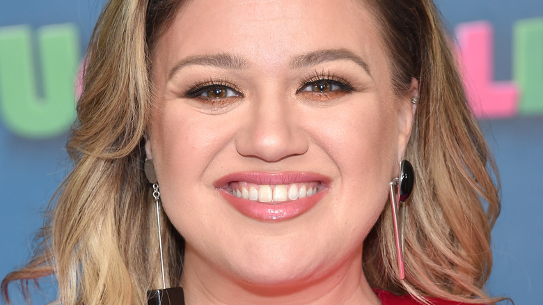 Kelly Clarkson smiling at an event