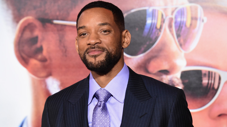 Will Smith posing on the red carpet