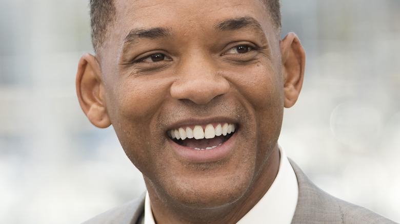 Will Smith smiling outside