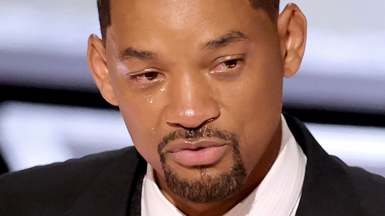 Will Smith accepting the Actor in a Leading Role award for 'King Richard' onstage