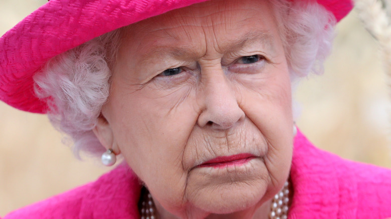 The queen looking disgruntled