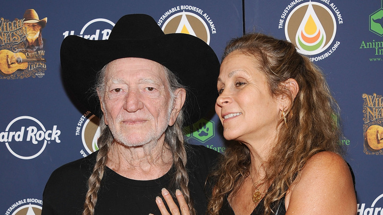 Willie Nelson and Annie D'Angelo pose in 2013
