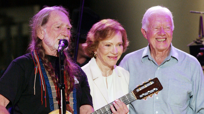 Willie Nelson playing alongside Jimmy and Rosalynn Carter