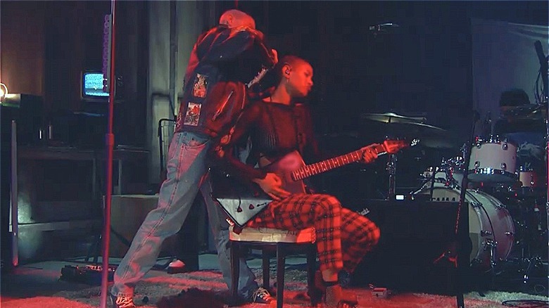 Willow Smith performing while getting her head shaved