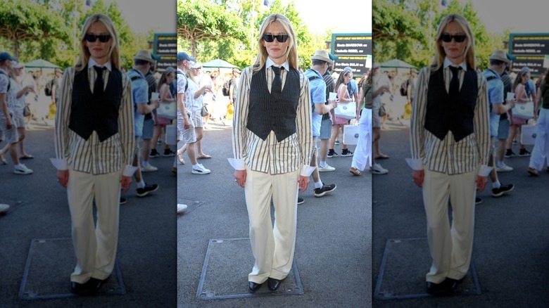 Sarah Pidgeon posing in pants, a button-up shirt, and a suit vest at Wimbledon.