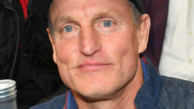 Woody Harrelson smirking