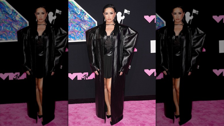 Demi Lovato black pleather jacket dress