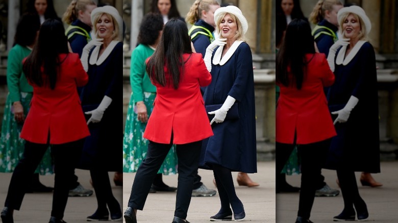 Joanna Lumley navy dress and white hat