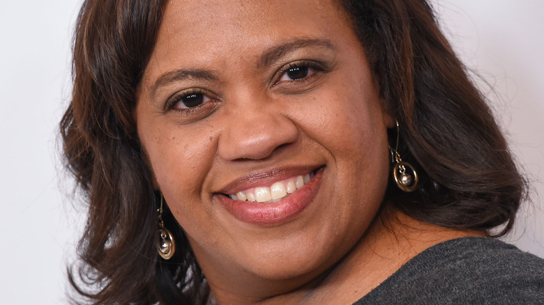 Chandra Wilson head tilted smiling at camera