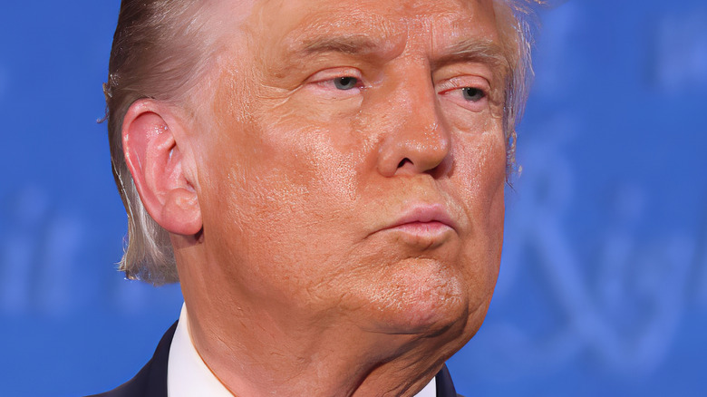 Donald Trump with pursed lips at a presidential debate