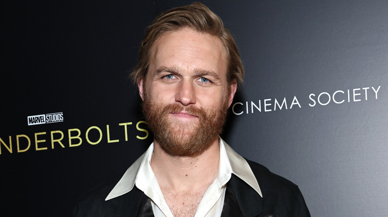 Wyatt Russell looking at camera