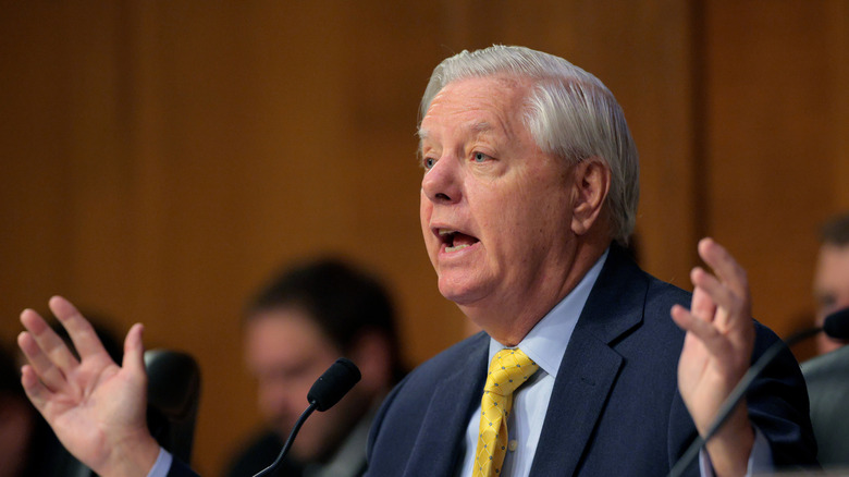 Lindsay Graham speaking with outstretched hands