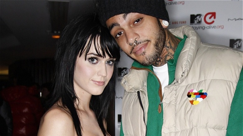 Katy Perry and Travie McCoy posing