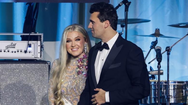 Erika and Charlie Kirk walk onto the stage in January 2025