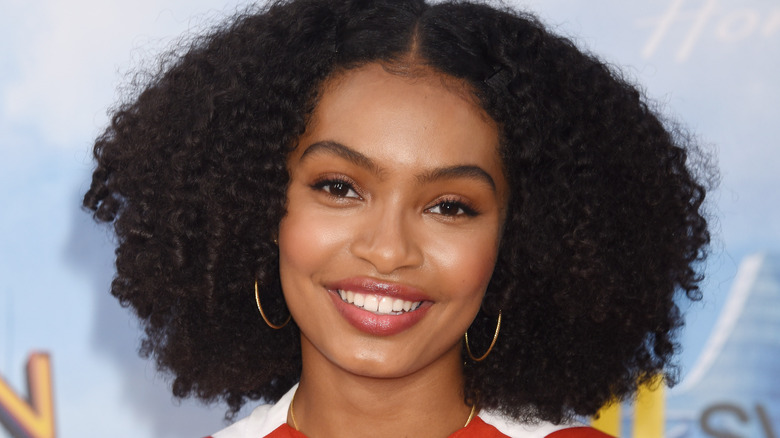 Yara Shahidi wearing hoop earrings