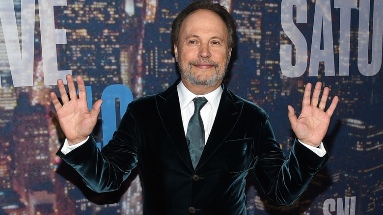 Billy Crystal in a tuxedo at the "SNL 40" red carpet