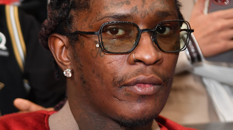 Rapper Young Thug attends the game between the Phoenix Suns and the Atlanta Hawks