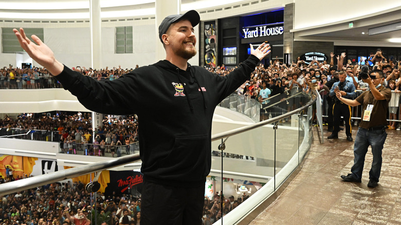 MrBeast posing in front of fans