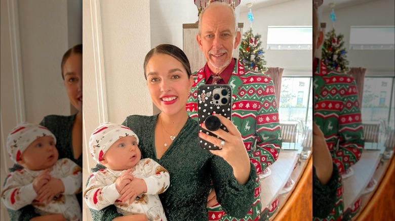 Mindy Minx and Larry selfie with baby