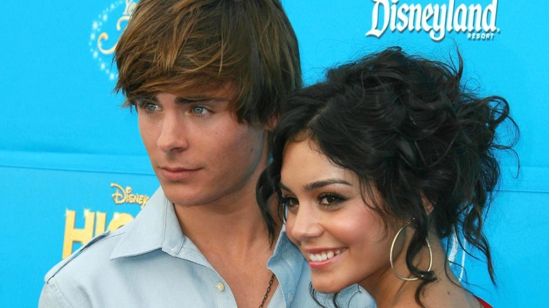 Zac Efron and Vanessa Hudgens pose together.