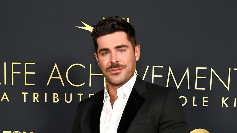 Zac Efron black tuxedo white shirt