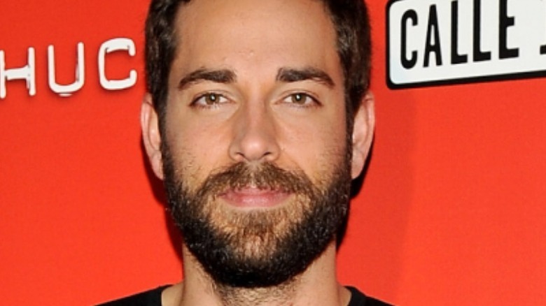 Zachary Levi red background
