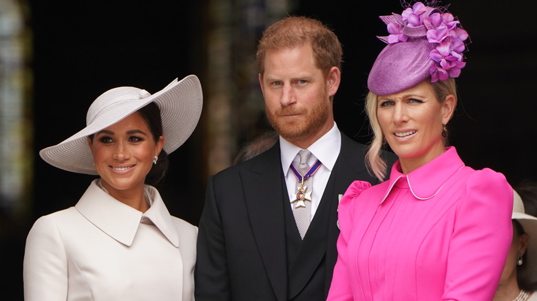 Mike Tindall, Meghan Markle, Prince Harry and Zara Tindall posing