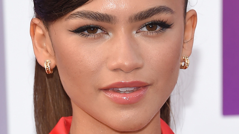 Zendaya slightly smiling with lips parted