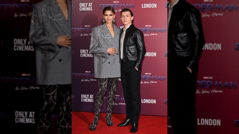 Zendaya and Tom Holland attend a photocall for "Spiderman: No Way Home" in 2021.