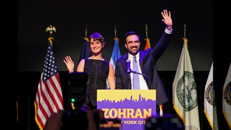 Zohran Mamdani and Rama Duwaji greet the crowd after his November 2025 win