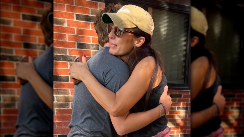 Joanna Gaines hugging her son Drake Gaines.