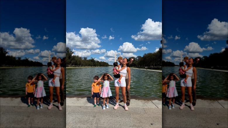 Katie Miller poses in white workout shorts and top during family outings in DC