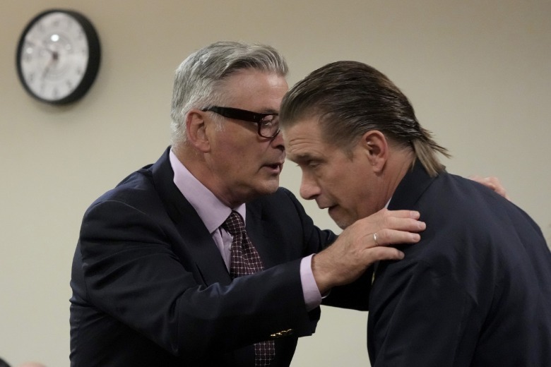 Alec Baldwin placing hands on Stephen Baldwin's shoulders