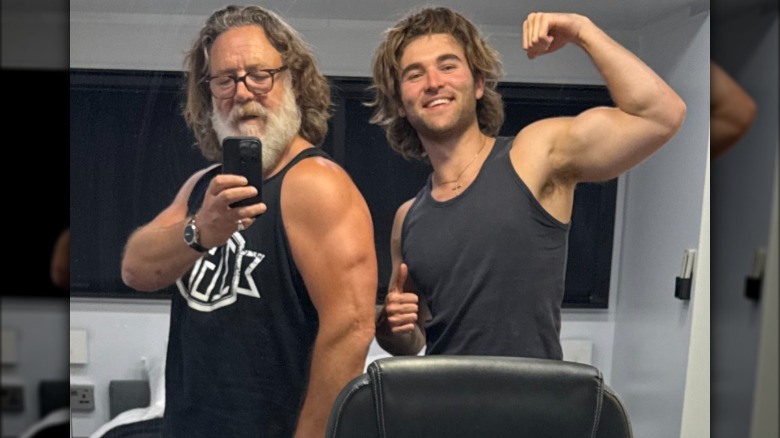 Russell and Tennyson Crowe posing together for a mirror selfie.